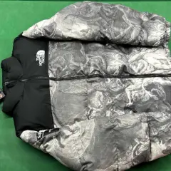 The North Face x Supreme Puffer